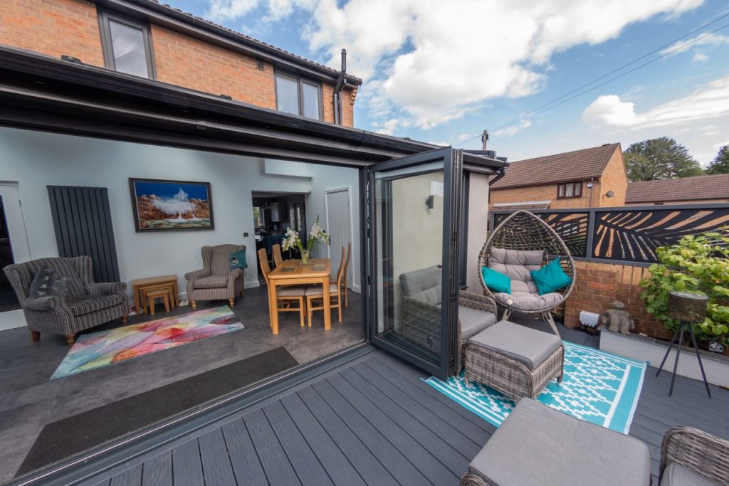 Conservatory with open double doors